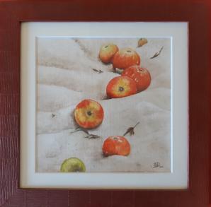 Des pommes dans le sable